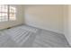 Bright bedroom with carpet and large window at 5932 Rosie Se Ln, Mableton, GA 30126