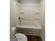Bathroom with tub and shower at 510 Overlook Rd, Covington, GA 30014