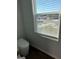 Powder room with a toilet and window with blinds at 510 Overlook Rd, Covington, GA 30014