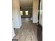 Bright entryway with luxury vinyl plank flooring leading to the living room at 510 Overlook Rd, Covington, GA 30014