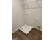 Laundry room with shelving and drain at 510 Overlook Rd, Covington, GA 30014