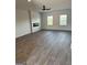 Spacious living room with fireplace and vinyl plank flooring at 510 Overlook Rd, Covington, GA 30014