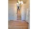 Elegant entryway with hardwood floors and staircase at 4284 Caroline Ct, Douglasville, GA 30135