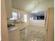 Kitchen with marble floors and white cabinets at 4284 Caroline Ct, Douglasville, GA 30135