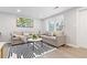 Living room with sectional sofa and coffee table, black and white rug at 1117 Wedgewood Nw Dr, Atlanta, GA 30318