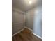 Walk-in closet with wire shelving and light wood flooring at 1273 Grayson Pkwy, Grayson, GA 30017