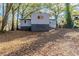 Cozy backyard with mature trees and a spacious area at 231 Glenrose Sw Cir, Atlanta, GA 30354