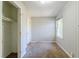 Small bedroom with closet and neutral walls at 231 Glenrose Sw Cir, Atlanta, GA 30354