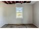 Bedroom with damaged wall and brown carpet at 231 Glenrose Sw Cir, Atlanta, GA 30354