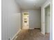 Simple bedroom with neutral walls and carpet at 231 Glenrose Sw Cir, Atlanta, GA 30354