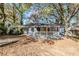 Ranch style home with front porch and mature trees at 231 Glenrose Sw Cir, Atlanta, GA 30354