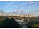 City skyline view with stadium and trees at sunrise at 587 Virginia Ave # 805, Atlanta, GA 30306