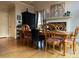 Elegant dining room with a large table and hardwood floors at 1030 Silver Thorne Dr, Loganville, GA 30052