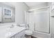 Bathroom with shower/tub combo, white vanity, and a large mirror at 2649 Porter Dr, Lawrenceville, GA 30044