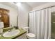 Small bathroom with green vanity and shower at 3512 Hidden Acres Dr, Atlanta, GA 30340