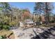 Two-story home with attached garage and mature trees at 3512 Hidden Acres Dr, Atlanta, GA 30340