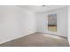 Simple bedroom with carpet flooring and a window at 5444 Wylstream, Norcross, GA 30093