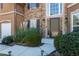 Inviting front entrance with stonework, landscaping, and a double door at 710 Trumpeter Ct, Fairburn, GA 30213