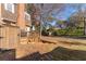 Landscaped backyard with deck and wooden fence at 111 Swanton Hill Ct, Decatur, GA 30030