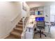 Basement staircase with a convenient built-in desk area at 111 Swanton Hill Ct, Decatur, GA 30030