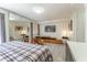 Comfortable bedroom with large TV and sitting area at 111 Swanton Hill Ct, Decatur, GA 30030