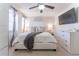 Main bedroom with a king-size bed and large dresser at 111 Swanton Hill Ct, Decatur, GA 30030