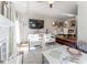 Open living room with hardwood floors and a view to the dining area at 111 Swanton Hill Ct, Decatur, GA 30030