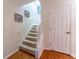 Clean carpeted stairs with hardwood flooring at 111 Swanton Hill Ct, Decatur, GA 30030