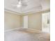 Primary bedroom with neutral walls, carpet, and ceiling fan at 4505 Shumart Dr, Snellville, GA 30039