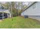 Gray house exterior with a carport and a side yard at 6103 Oakwood Sw Cir, Covington, GA 30014