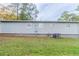 Gray house exterior with a view of the backyard at 6103 Oakwood Sw Cir, Covington, GA 30014