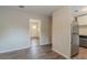 View of kitchen showing stainless steel appliances and flooring at 6103 Oakwood Sw Cir, Covington, GA 30014