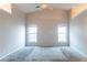 Well-lit bedroom with high ceiling and neutral walls at 822 Fairmont Park Dr, Dacula, GA 30019