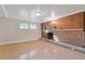 Unfinished basement with tiled floors and a fireplace at 2081 Dodson Sw Dr, Atlanta, GA 30311