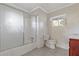 Clean bathroom with shower/tub combo and tiled floor at 2081 Dodson Sw Dr, Atlanta, GA 30311