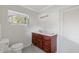 Bathroom with vanity, toilet, and window at 2081 Dodson Sw Dr, Atlanta, GA 30311