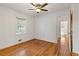 Bedroom with wood floors, ceiling fan, and neutral walls at 2081 Dodson Sw Dr, Atlanta, GA 30311