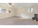 Spacious bedroom with ceiling fan and window at 2081 Dodson Sw Dr, Atlanta, GA 30311