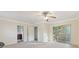 Bright bedroom featuring a private bath and sliding glass doors at 2081 Dodson Sw Dr, Atlanta, GA 30311