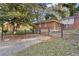 Side view of house showcasing brick exterior and landscaping at 2081 Dodson Sw Dr, Atlanta, GA 30311