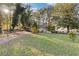 Brick ranch house with a large front yard and mature trees at 2081 Dodson Sw Dr, Atlanta, GA 30311