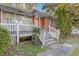 House exterior featuring a white porch and steps at 2081 Dodson Sw Dr, Atlanta, GA 30311