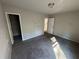 Bedroom with closet and neutral walls at 2754 Topaz Rd, Riverdale, GA 30296