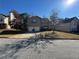Two-story house with attached two-car garage and front yard at 2754 Topaz Rd, Riverdale, GA 30296