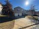 Two-story house with attached two-car garage and driveway at 2754 Topaz Rd, Riverdale, GA 30296