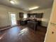 Spacious kitchen featuring an island and stainless steel appliances at 2754 Topaz Rd, Riverdale, GA 30296
