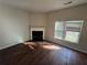 Living room with hardwood floors and fireplace at 2754 Topaz Rd, Riverdale, GA 30296