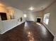 Living room with hardwood floors and a fireplace at 2754 Topaz Rd, Riverdale, GA 30296