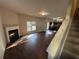 Spacious living room with hardwood floors and fireplace at 2754 Topaz Rd, Riverdale, GA 30296