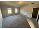 Main bedroom with vaulted ceiling and carpet flooring at 2754 Topaz Rd, Riverdale, GA 30296